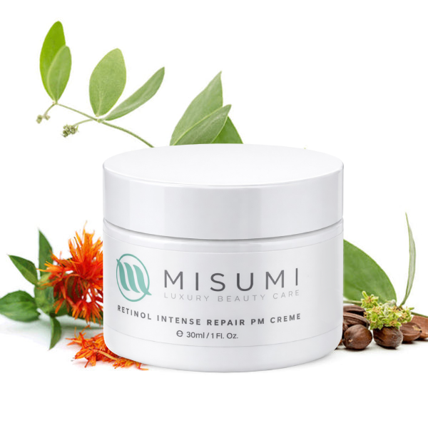 White jar of Misumi cream with natural elements on a white background